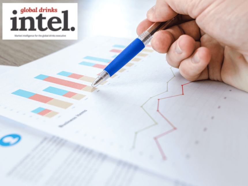 A pen pointing at a graph on a sheet of paper